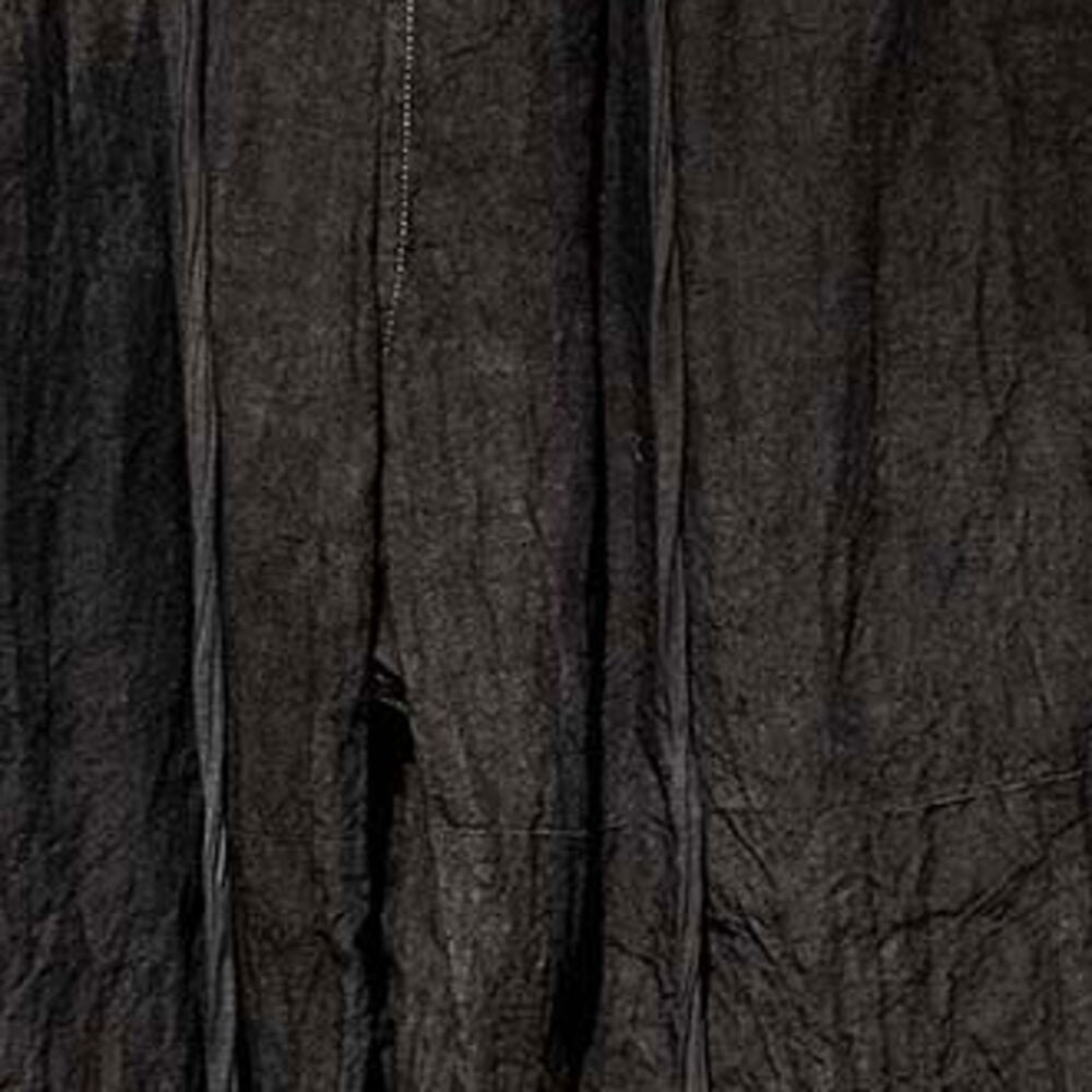 Typical linen after a day worn — deep set wrinkles