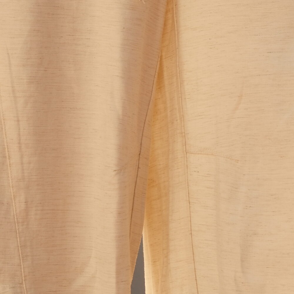 Our flax-linen cloth after a full day worn — smooth, no set creases